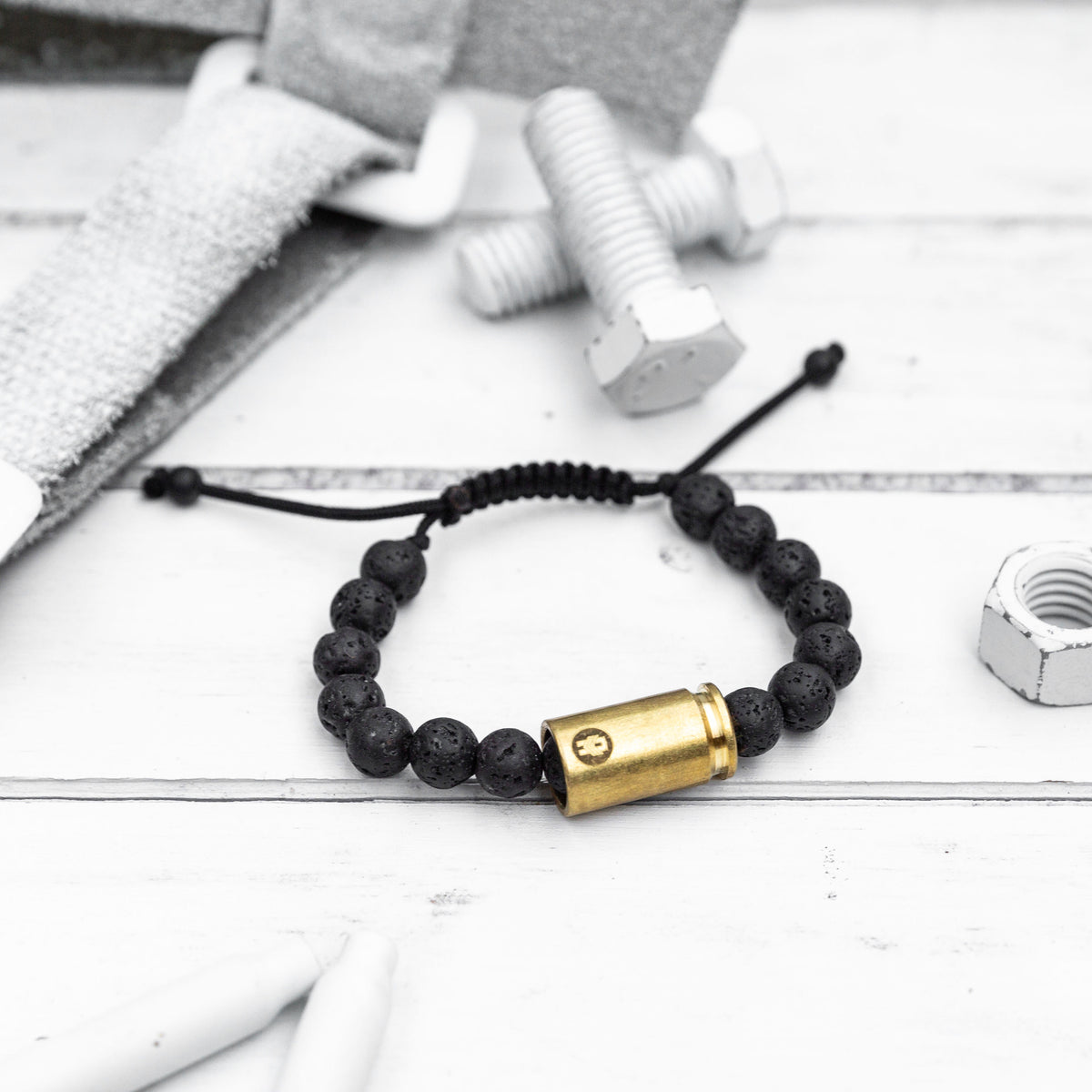 Brass & Unity Buddy Check Lava Rock